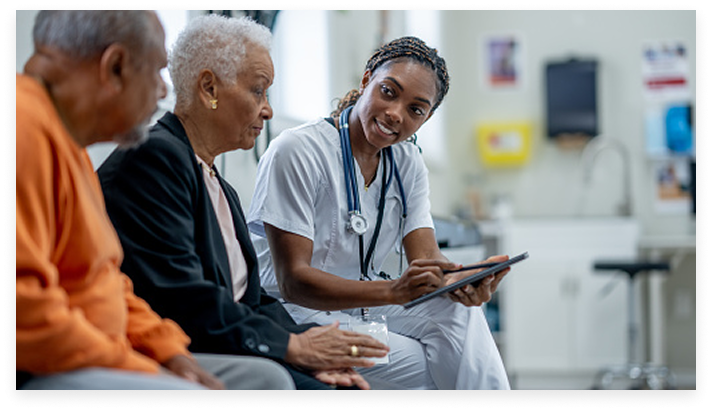 Doctor talking to patients